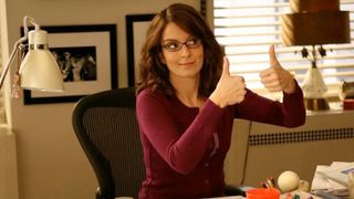 Tina Fey as Liz Lemon gives two thumbs up on 30 Rock