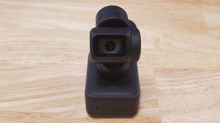 An Insta360 Link on a table without a tripod