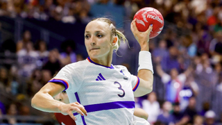 Alicia Toublanc of France controls the ball ahead of the Norway vs France women's Handball final at Olympics 2024