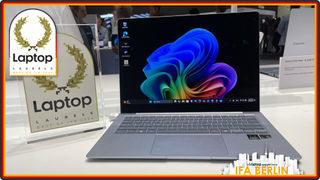 Samsung Galaxy Book 5 Pro 360 laptop next to a Laptop Laurel award at IFA Berlin 2024