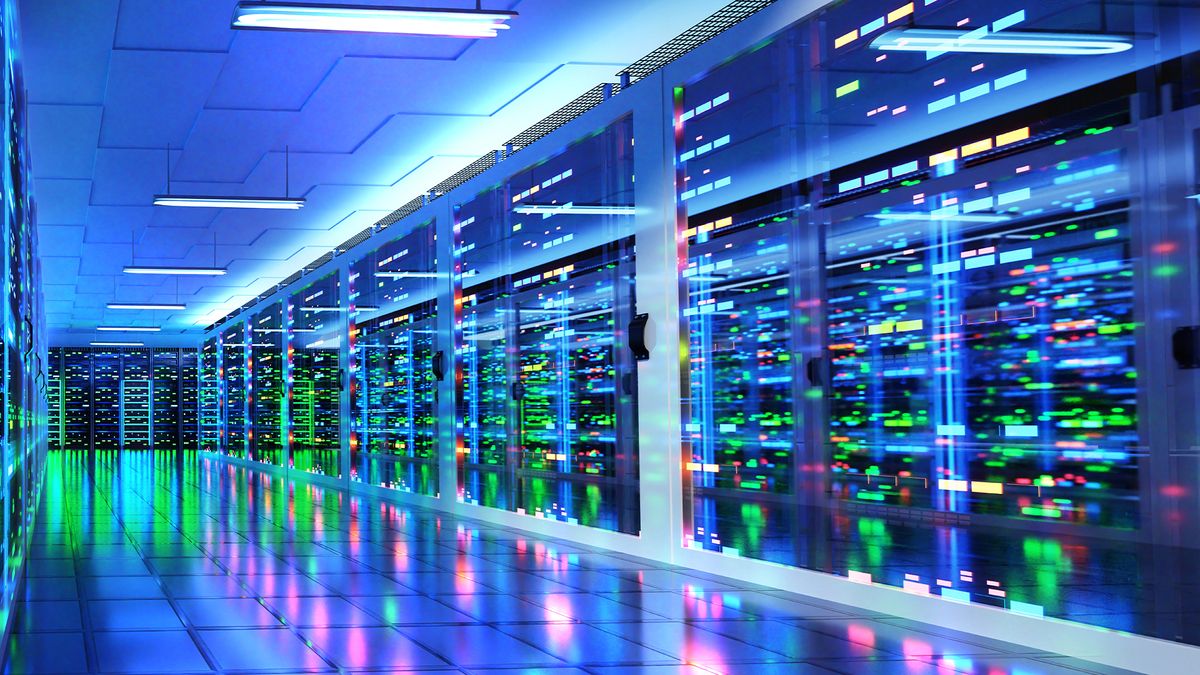 Edge Data Center concept image showing data center server room with glowing server racks. 