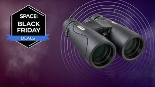 The Celestron Nature DX ED 12x50 binoculars on a purple background with a Space.com Black Friday badge