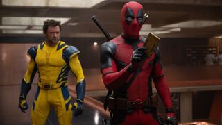 Deadpool holds a TVA timepad as Wolverine looks on in Deadpool and Wolverine