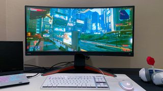 BenQ Mobiuz EX3415R on a gaming desk