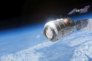 An artist's concept of Orbital Sciences' unmanned Cygnus cargo spacecraft approaching the International Space Station.