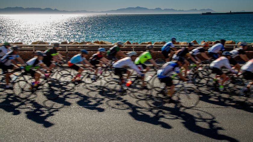 Shot showing a group of cyclists in the sun