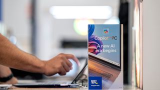 AI PCs concept image showing a person using a Microsoft Copilot+ laptop at a Best Buy store in Union City, California, US.