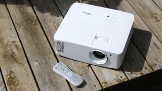 Optoma UHD38 projector in white