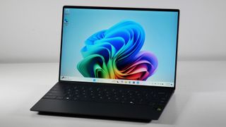 Dell XPS 13 9345 (Snapdragon X Elite) open on a white background