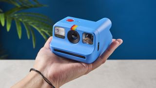 A blue Polaroid Go Gen 2 instant camera