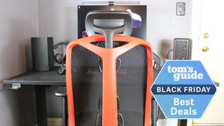 The Herman Miller Vantum gaming chair pushed into a desk with a Tom's Guide Black Friday deal badge