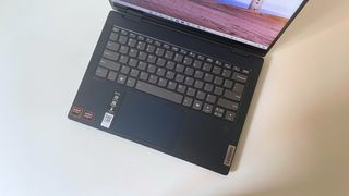 The keyboard on the Lenovo IdeaPad 5 2-in-1 seen from above on a white table