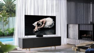 The Samsung Q800T QLED in a living room displaying ballet.