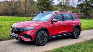 Angled side view of Mercedes EQB parked on a country lane