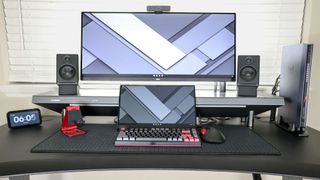 A desk setup built around the AtomMan G7 Ti with it on the right side