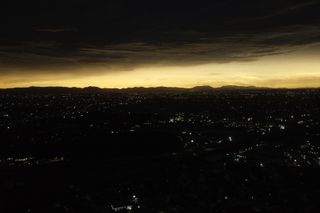 The sky appears to be bathed in ethereal light above Torreon, Mexico.