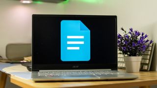 Google Docs logo on a laptop screen