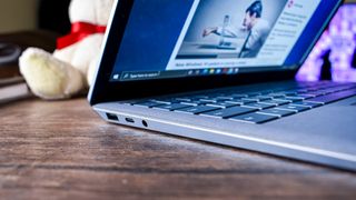 Surface Laptop 4 on a coffee table, showcasing its ports