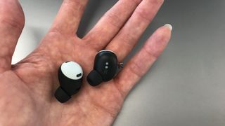 Google Pixel Buds Pro in a hand