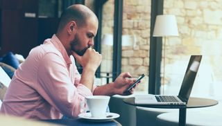 Man looking at smartphone