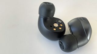 a closeup of the technics eah-az40 true wireless earbuds