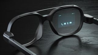 AR glasses resting on a table with a hud on display giving the user the option to call, message, get directions or take a photo