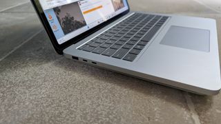 Surface Laptop Studio 2 on tiles