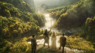 Elrond, Gil-galad, Galadriel, and Arondir standing on a cliff top looking at their elf forces in The Rings of Power season 2 finale