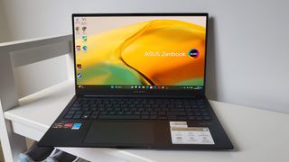 Asus Zenbook 15 OLED (2023) on a shelf