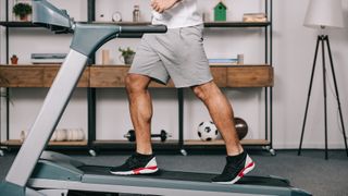 Man on treadmill at home