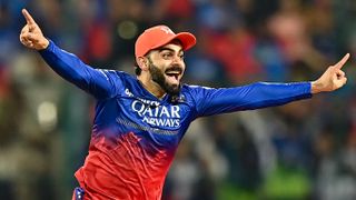 Royal Challengers Bengaluru's Virat Kohli celebrates after the dismissal of Delhi Capitals' Jake Fraser-McGurk (not pictured) ahead of the Indian Premier League IPL Playoffs 2024 