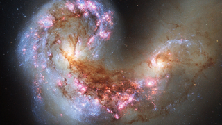 The colliding galaxies of the Antenna Galaxy. Does such a merger create the universe's most monsterous galaxies?