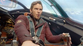 Marvel Timeline: Chris Pratt as Starlord flying a ship in the movie Guardians of the Galaxy.