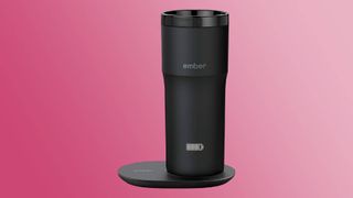 Black Ember Travel Mug 2+ against a pink gradient background