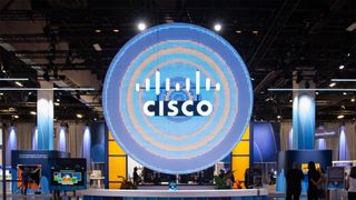 Cisco logo and branding pictured in the exhibitor hall at Cisco Live 2024, held in Las Vegas, Nevada.