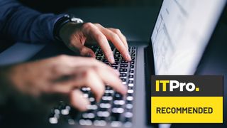 best usenet providers - person typing on laptop keyboard