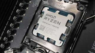 An AMD Ryzen 7 7800X3D slotted into a motherboard