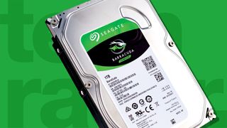 Seagate hard drive on a green background.