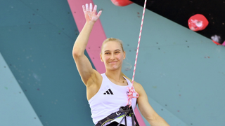  Janja Garnbret of Slovenia waves to the crowd ahead of the women's Sport Climbing Combined final at Olympics 2024