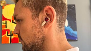 Bang & Olufsen Beoplay EX being worn in ears