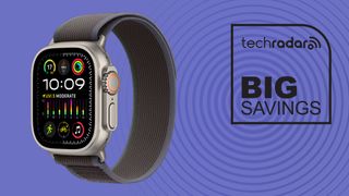 Apple Watch Ultra 2 with blue and black trail loop band on purple background with black TechRadar big savings icon