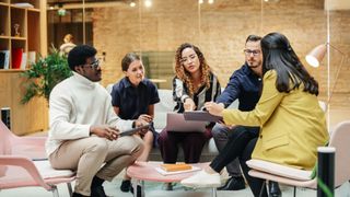 young workers being productive in an office meeting