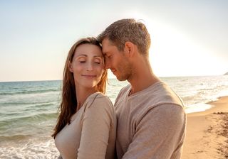 An attractive couple on the beach.