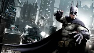 Best Batman games: Batman getting ready to punch someone with Gotham in the background. 