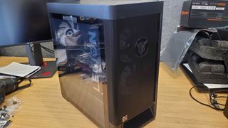 black gaming PC with glass side