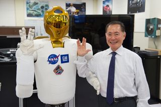 George Takei (Star Trek's Sulu) and Robonaut throwing the Vulcan salute during a recent visit to NASA Johnson Space Center.