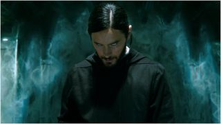 Jared Leto in Morbius looking at the camera with a creepy expression.