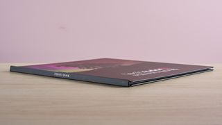 A close-up of the spine of the Mixbook photo book.