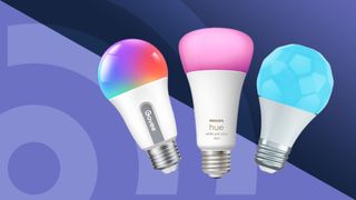 Three smart light bulbs on purple background