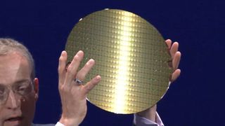 Intel CEO Pat Gelsinger holding a wafer at Computex 2024 keynote